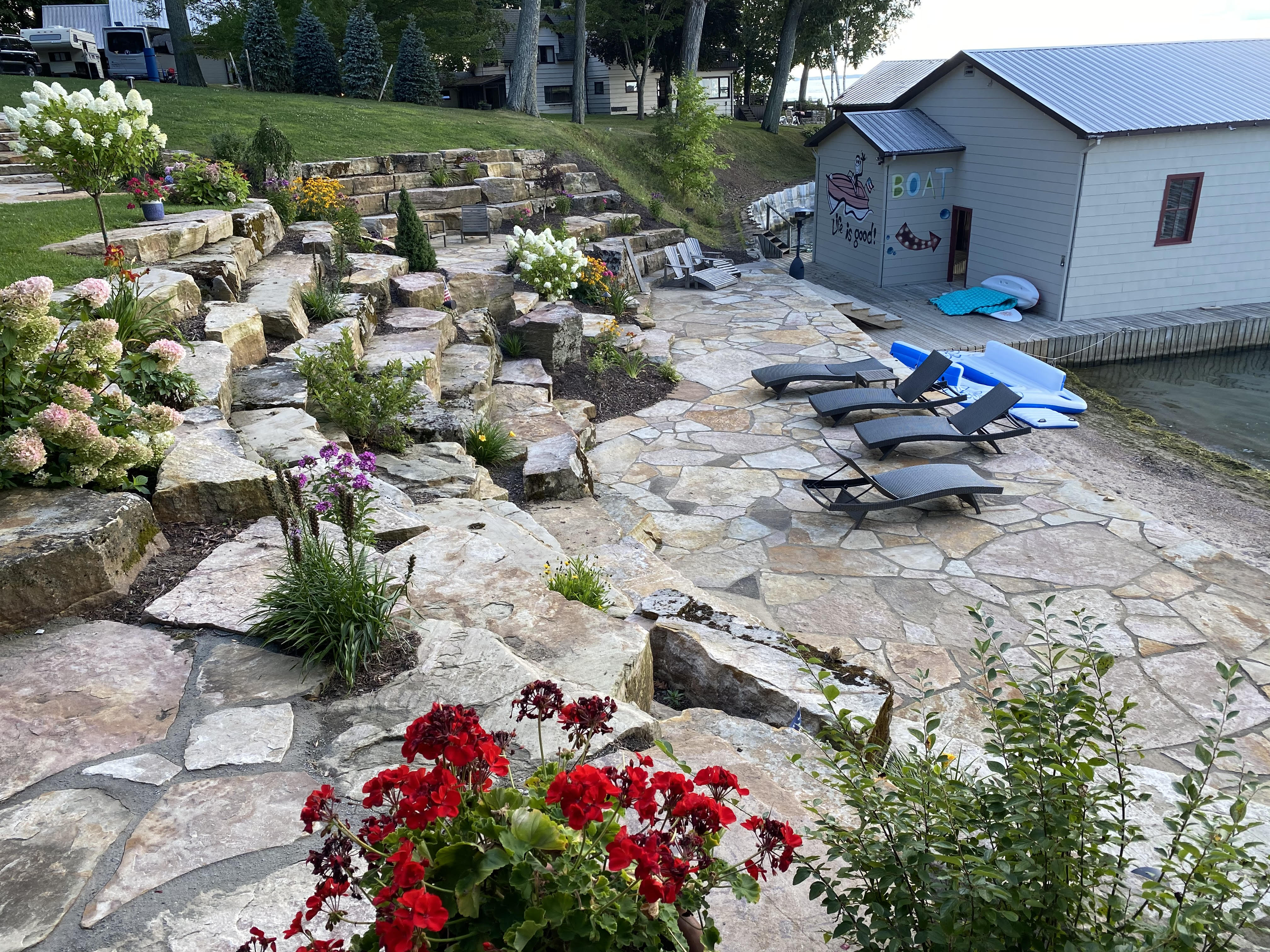 Boulder Wall | Flagstone Patio | Perennial Gardens